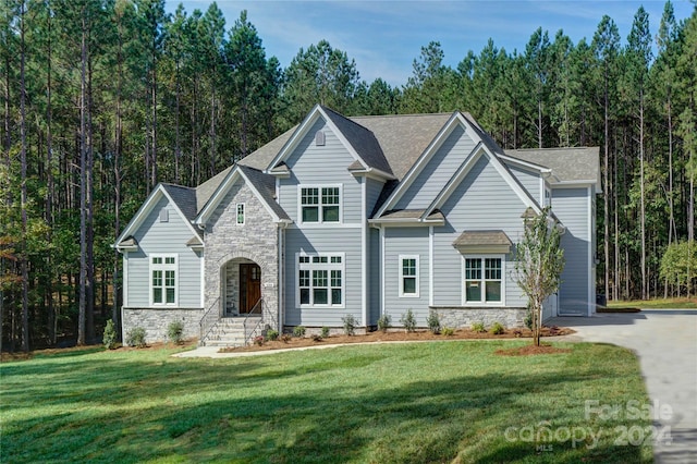 view of front of house with a front lawn