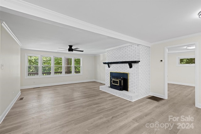 unfurnished living room featuring ceiling fan, crown molding, and light hardwood / wood-style floors