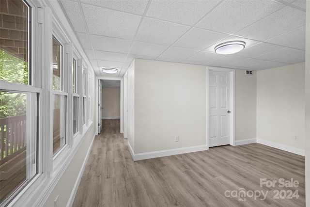 spare room with light wood-type flooring