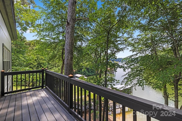 deck featuring a water view