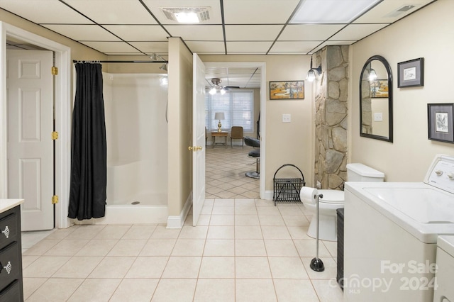 bathroom featuring a paneled ceiling, vanity, a shower with curtain, and tile patterned flooring