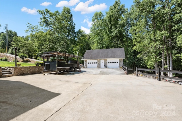 garage featuring a carport