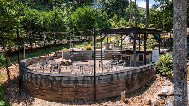 exterior space featuring an outdoor fire pit