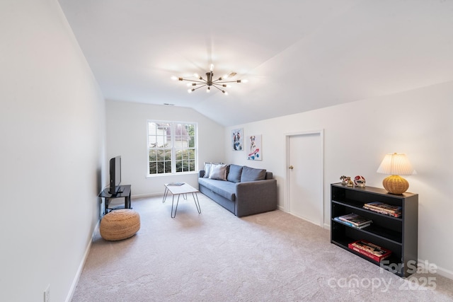 living area featuring a chandelier, lofted ceiling, carpet flooring, and baseboards