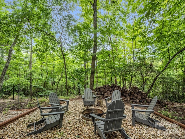 exterior space with an outdoor fire pit