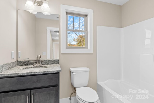 full bathroom featuring toilet, shower / tub combination, and vanity