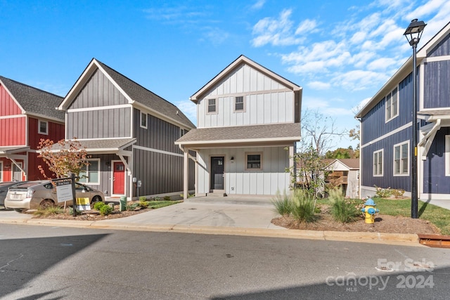 34 Wheeler Rd, Weaverville, NC 28787 - view of front facade featuring a shingled roof and board and batten siding