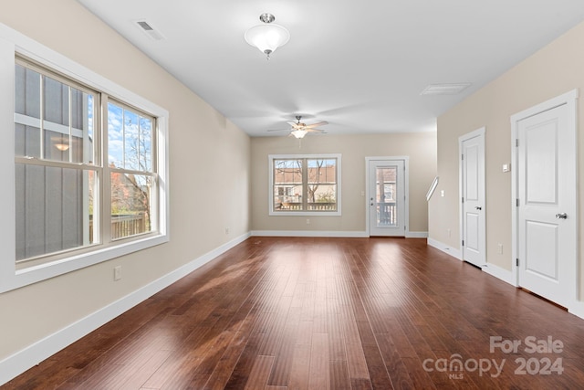 34 Wheeler Rd, Weaverville, NC 28787 - unfurnished living room featuring a ceiling fan, dark wood-style flooring, and baseboards