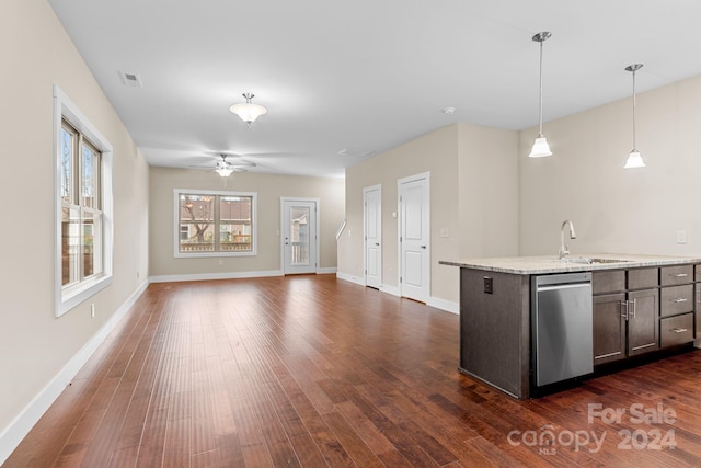 kitchen with ceiling fan, dark hardwood / wood-style flooring, sink, dark brown cabinetry, and decorative light fixtures