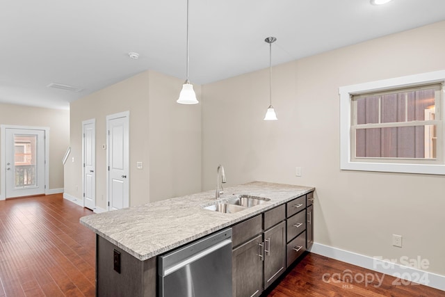 kitchen with dishwasher, sink, kitchen peninsula, hanging light fixtures, and dark wood-type flooring