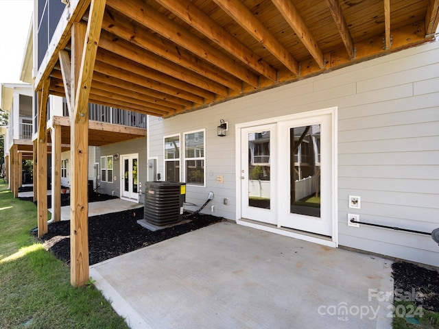 view of patio / terrace with french doors and central AC