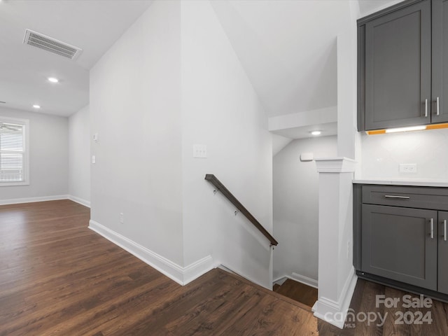 stairs with hardwood / wood-style flooring