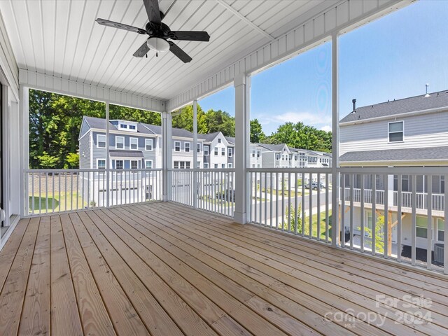 wooden deck with ceiling fan