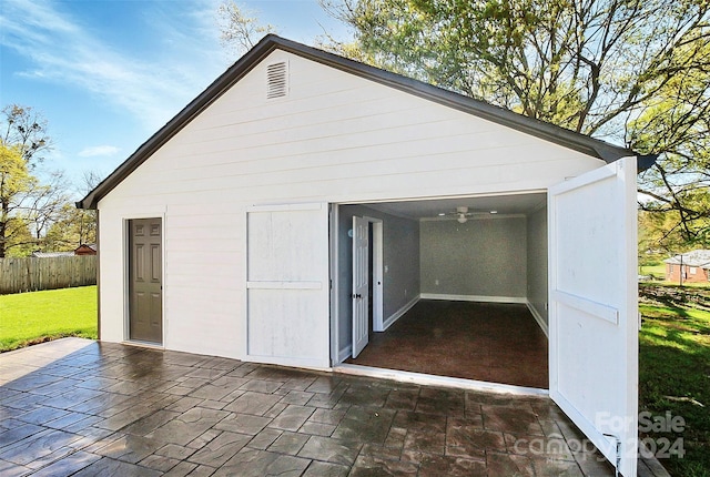 garage with ceiling fan