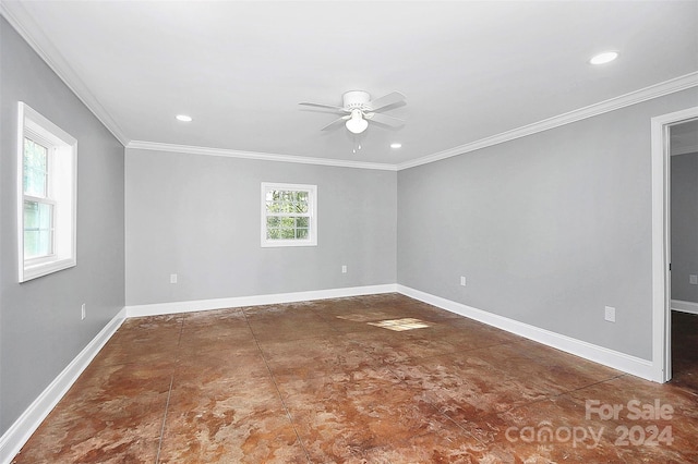 empty room featuring ceiling fan and ornamental molding