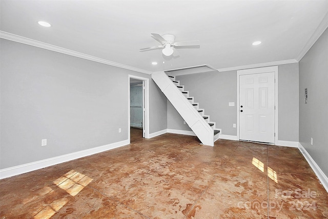 interior space featuring ceiling fan and crown molding