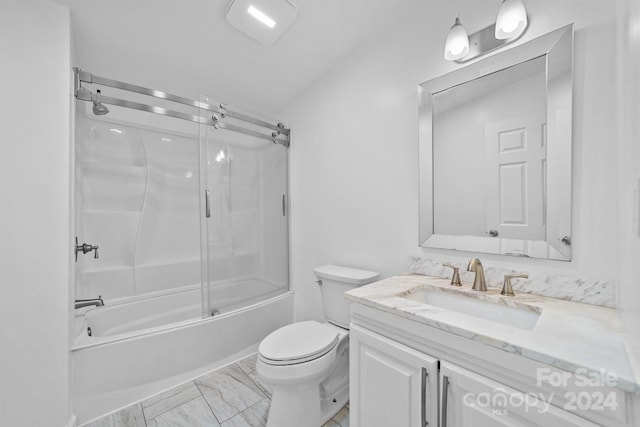 full bathroom with toilet, vanity, and tub / shower combination