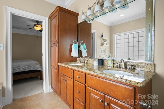 bathroom with tile patterned floors, vanity, ceiling fan, and ornamental molding