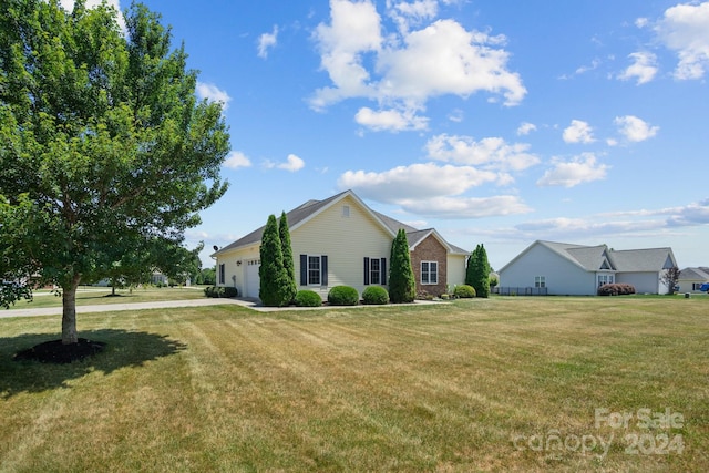 ranch-style house with a front lawn