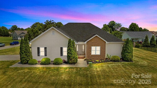 104 Castle Pines Ln, Statesville, NC 28625 - traditional-style home with a lawn and roof with shingles