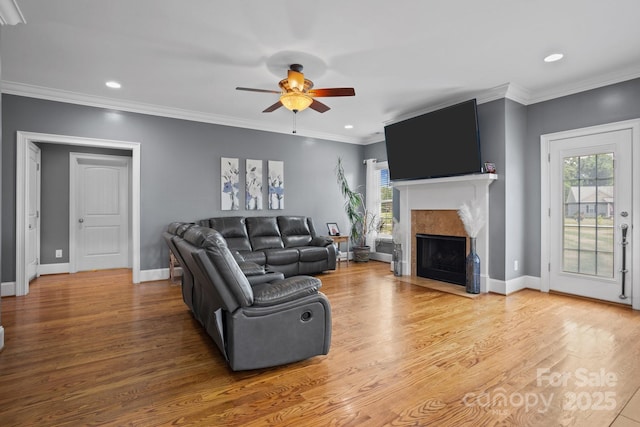 104 Castle Pines Ln, Statesville, NC 28625 - living room with ceiling fan, a fireplace, wood finished floors, baseboards, and recessed lighting