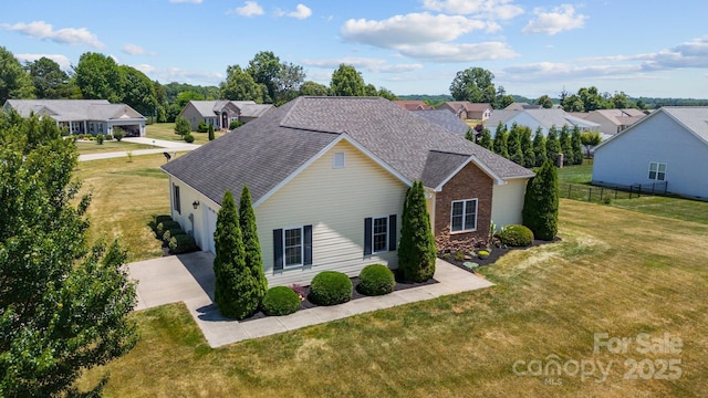 104 Castle Pines Ln, Statesville, NC 28625 - traditional home featuring a garage, concrete driveway, a residential view, and roof with shingles