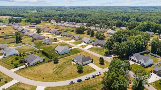 104 Castle Pines Ln, Statesville, NC 28625 - aerial perspective of suburban area featuring a heavily wooded area