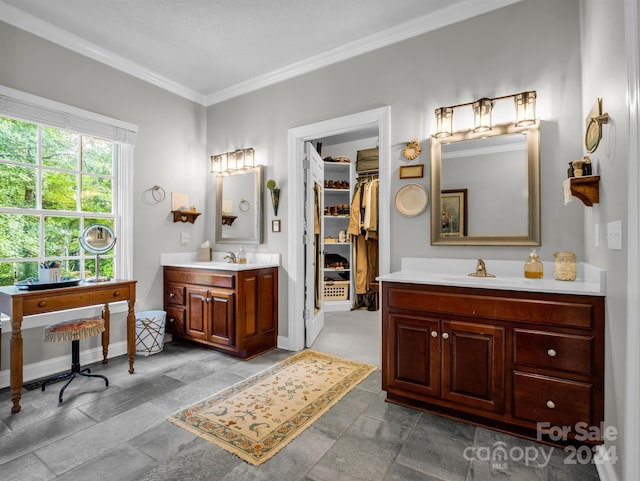 bathroom featuring vanity and crown molding