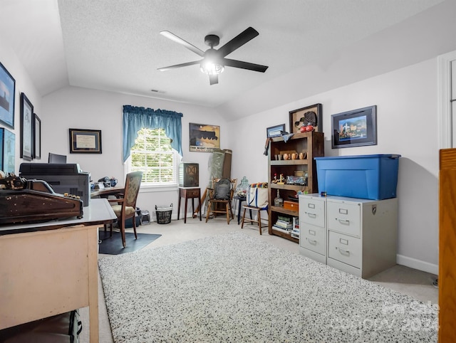 office with ceiling fan, a textured ceiling, and lofted ceiling