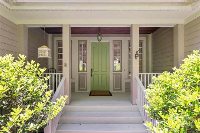 entrance to property with a porch