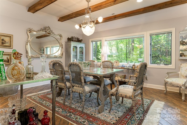 dining space featuring beamed ceiling, dark hardwood / wood-style flooring, and an inviting chandelier