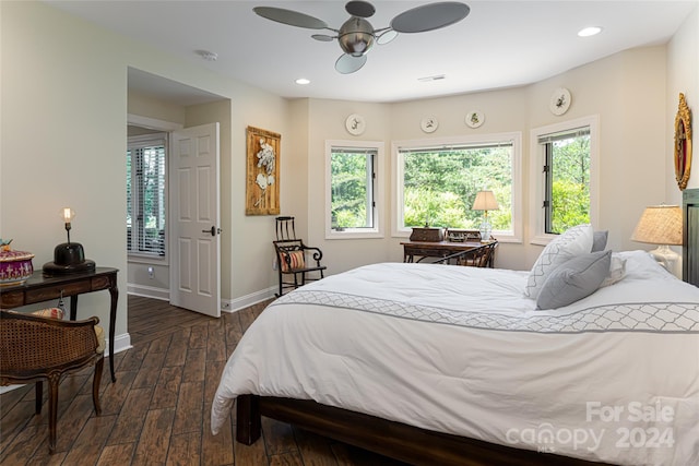 bedroom featuring ceiling fan and dark hardwood / wood-style flooring