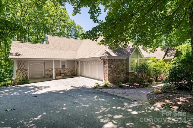 view of front of home with a garage