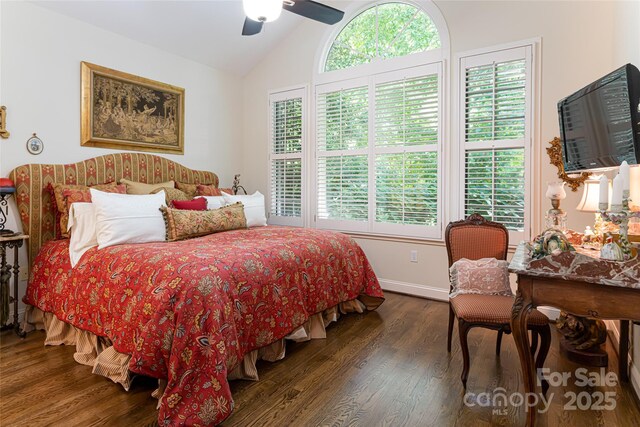 57 Old Hickory Trl, Hendersonville, NC 28739 - bedroom featuring lofted ceiling, multiple windows, wood finished floors, baseboards, and a ceiling fan