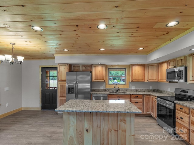 kitchen with light wood-style floors, wood ceiling, a sink, and appliances with stainless steel finishes