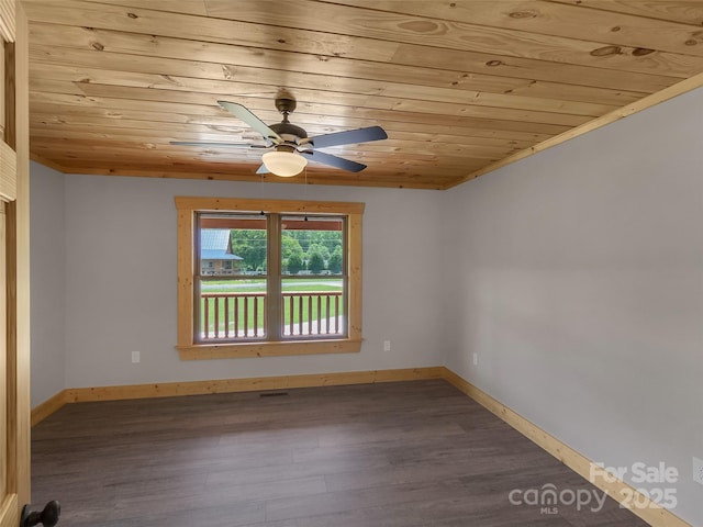 unfurnished room featuring baseboards, a ceiling fan, wood finished floors, and wood ceiling