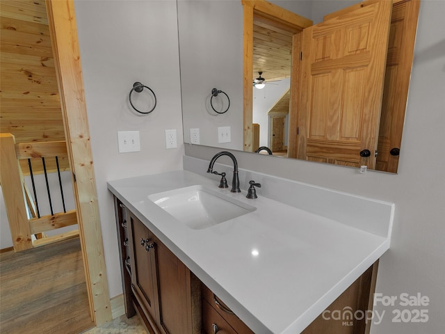 bathroom with vanity and a ceiling fan