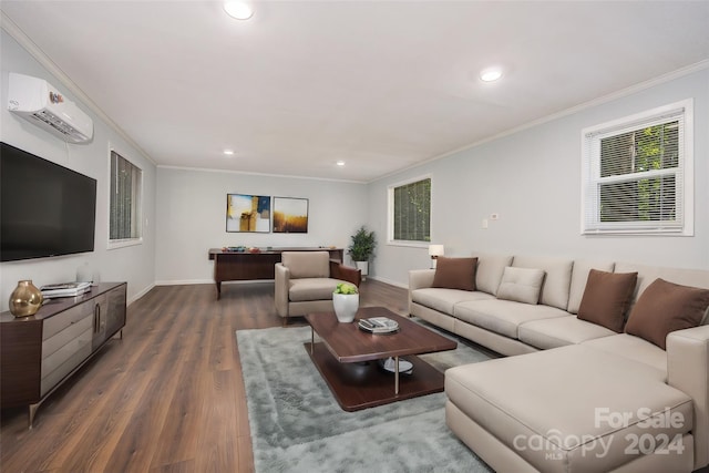 living room featuring a wall mounted air conditioner, dark hardwood / wood-style flooring, ornamental molding, and a wealth of natural light