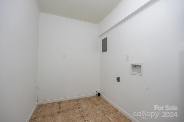 laundry area featuring hookup for an electric dryer, washer hookup, electric panel, and light tile patterned floors