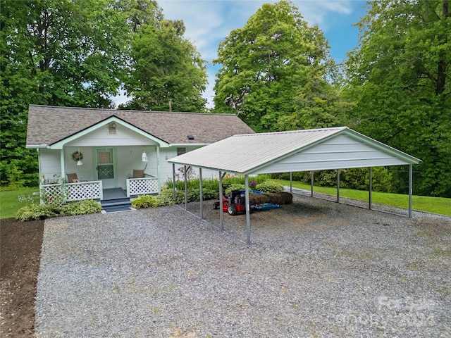 view of front of home featuring covered porch and a carport