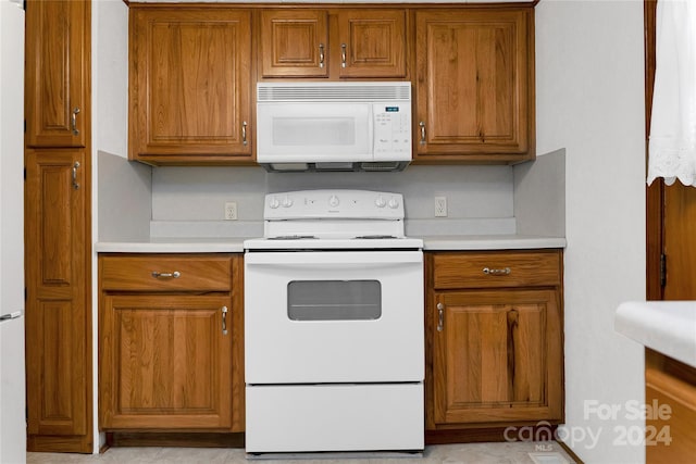 kitchen featuring white appliances