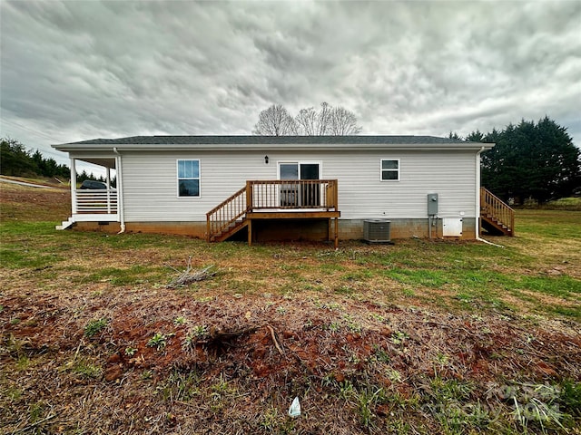 back of house featuring crawl space, central air condition unit, stairway, and a wooden deck