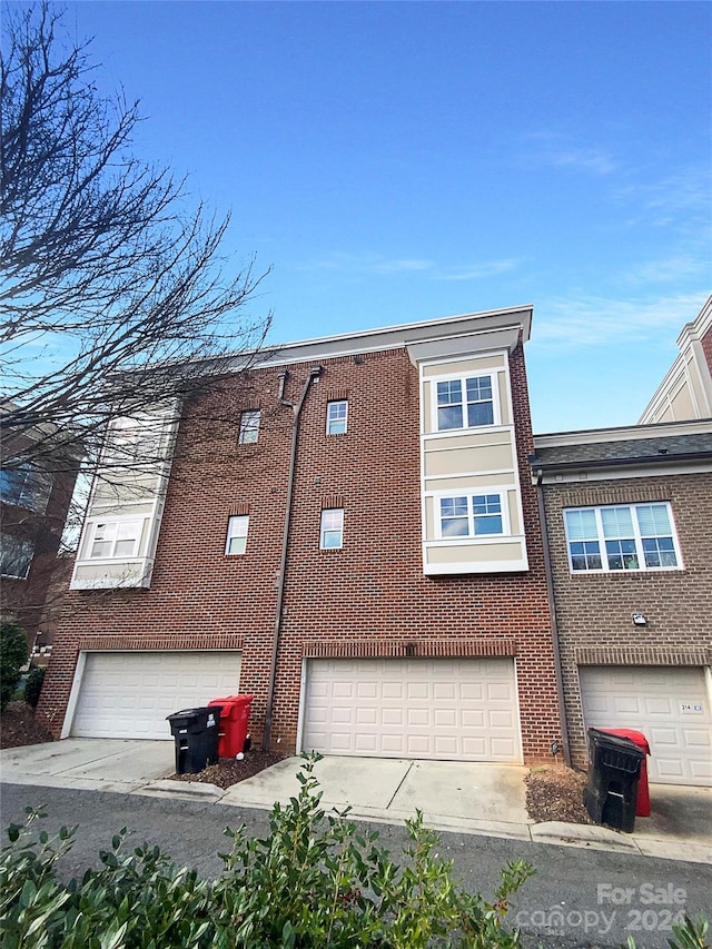 exterior space with a garage