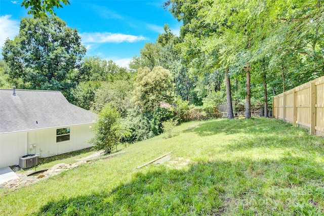 view of yard featuring central AC