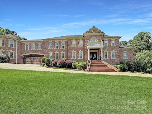 view of property featuring a front yard