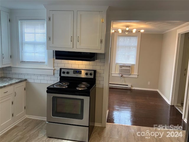 kitchen with white cabinetry, a baseboard radiator, decorative backsplash, and electric stove