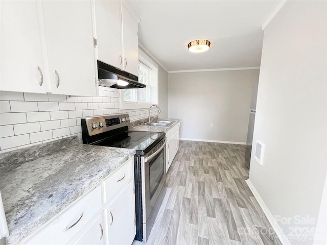 kitchen with sink, white cabinetry, ornamental molding, and stainless steel electric range oven