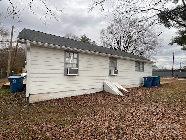 view of home's exterior featuring cooling unit