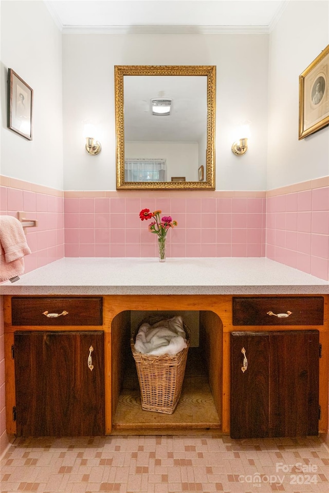 bathroom featuring vanity, tile patterned floors, and decorative backsplash