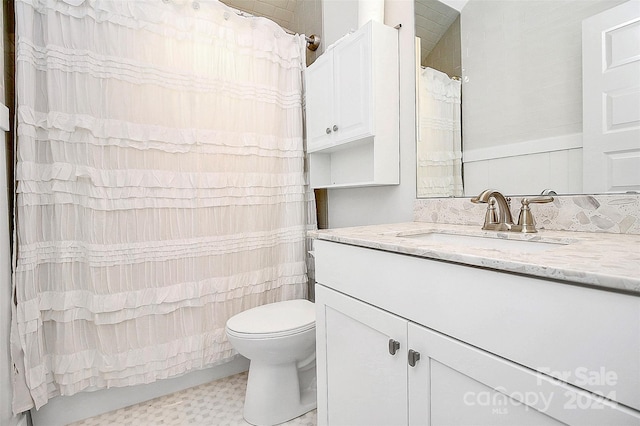 full bathroom with toilet, vanity, and shower / bath combination with curtain